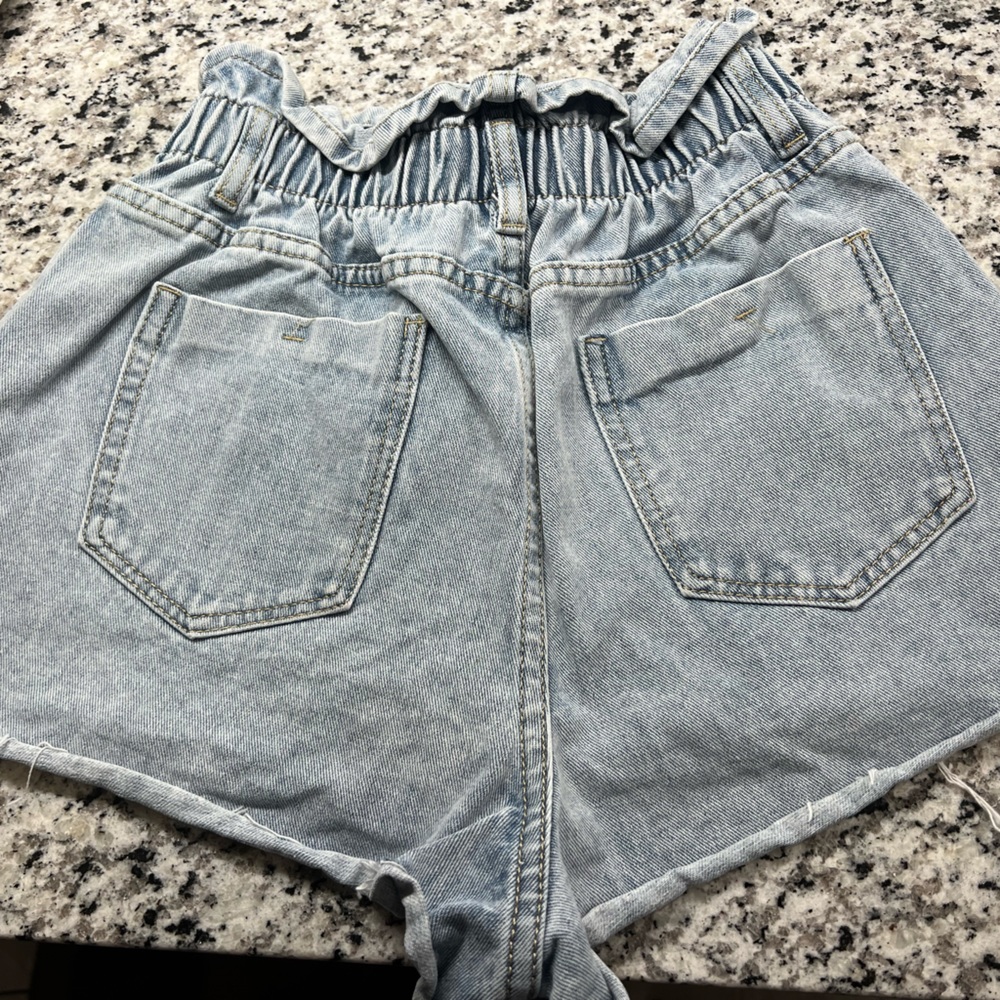 High waisted light wash jean shorts